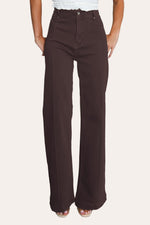 Dark Chocolate pintuck flare jeans with front seam, showcasing seamed wide leg jeans design.